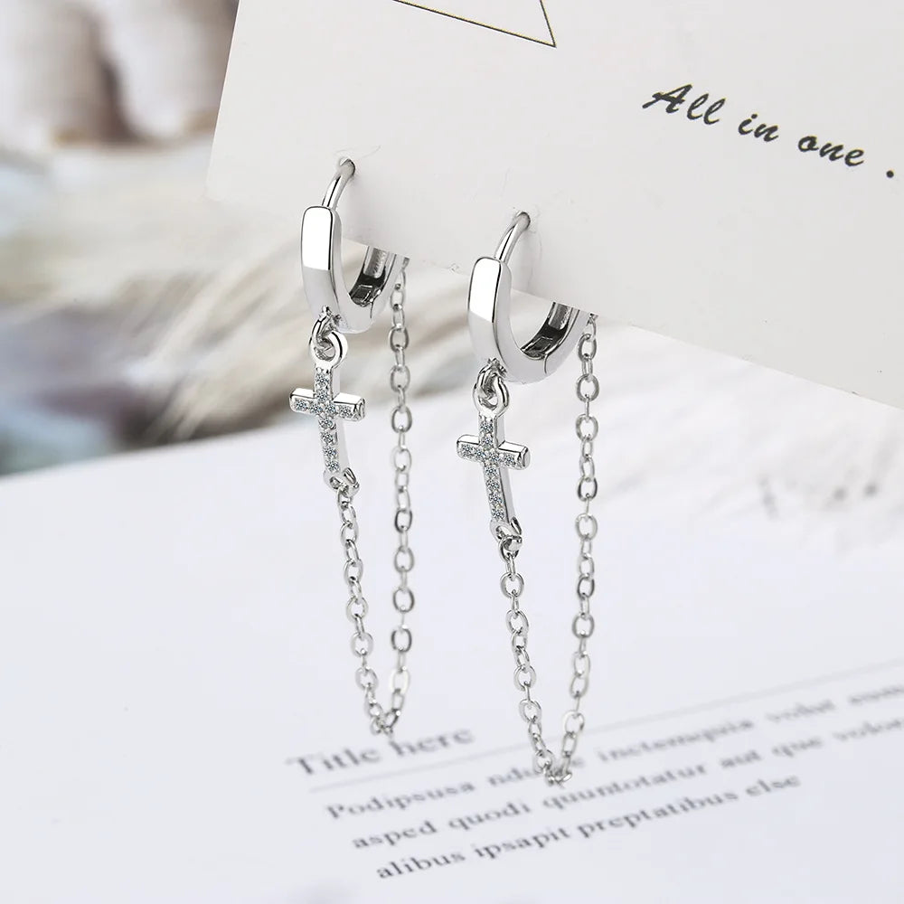 boucle oreille chaîne croix