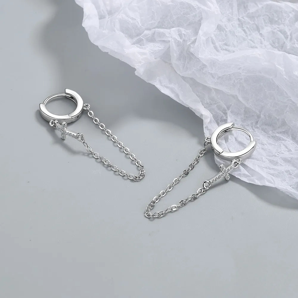 boucle oreille chaîne croix