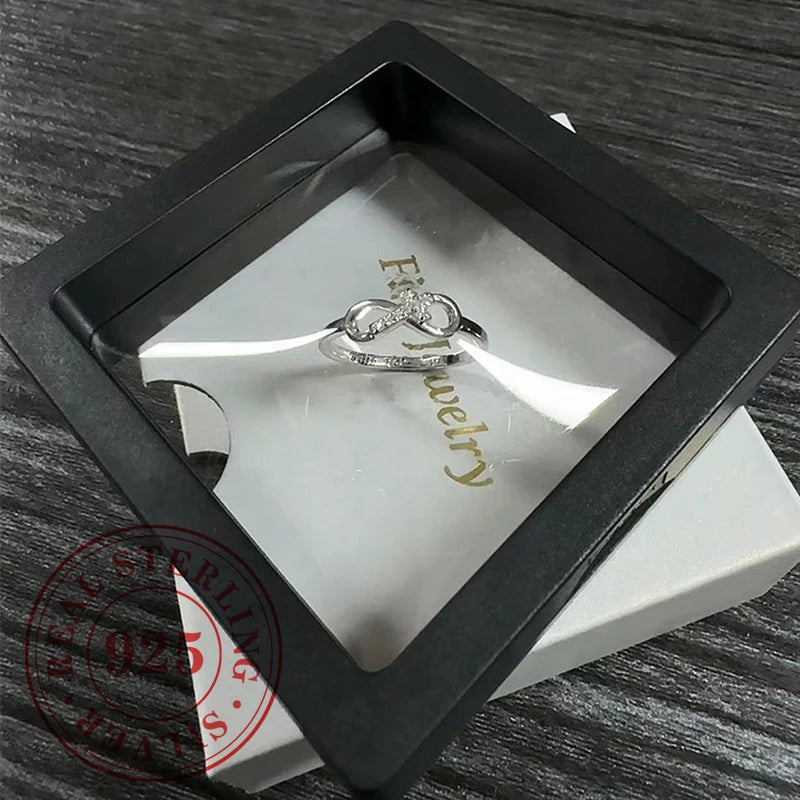 bague croix infini